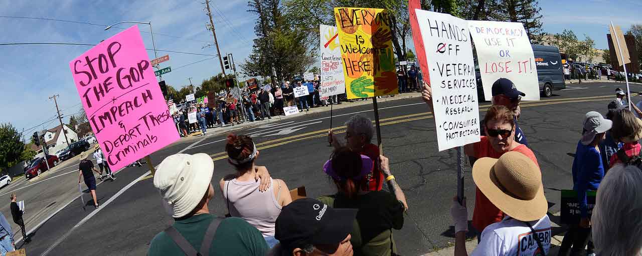 Protesters with signs on the street